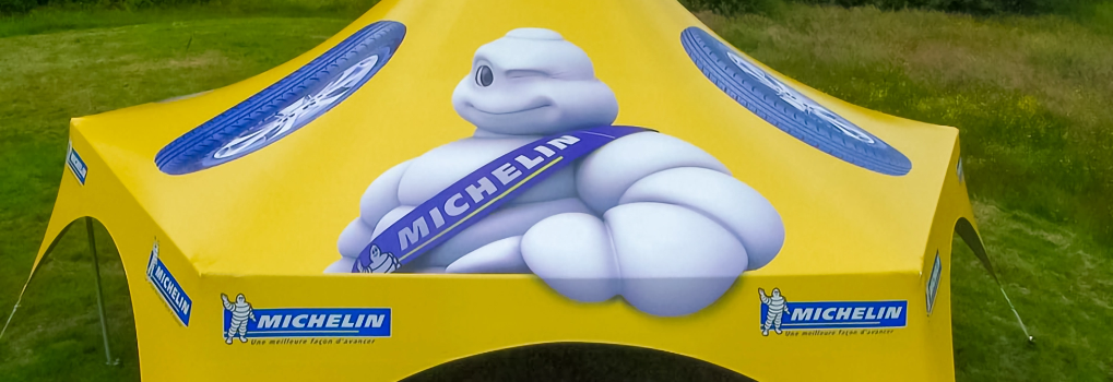 Custom logo tent with full-color printed canopy, branded event tent showcasing logo for trade shows, festivals, and corporate activations.