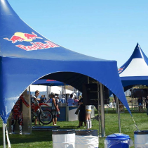 Custom branded canopy tent with logo, professional event tent used for corporate outdoor marketing and brand activation.