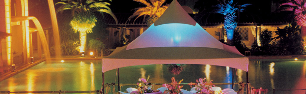 pop up canopy tent beside a pool