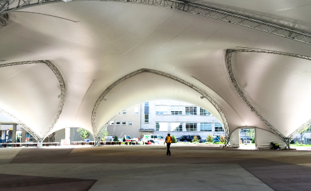 Large engineered fabric structure with open interior space