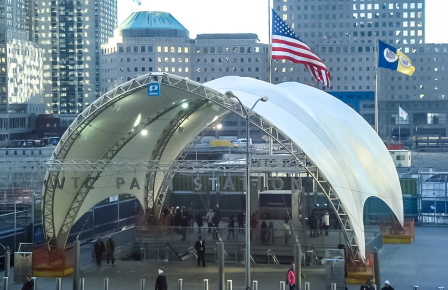 Large engineered fabric structure at an urban public plaza