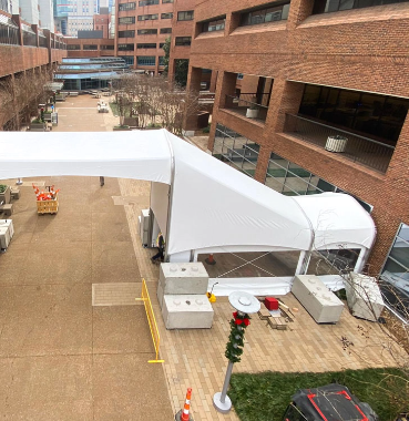 Custom fabric building installed in an urban construction site